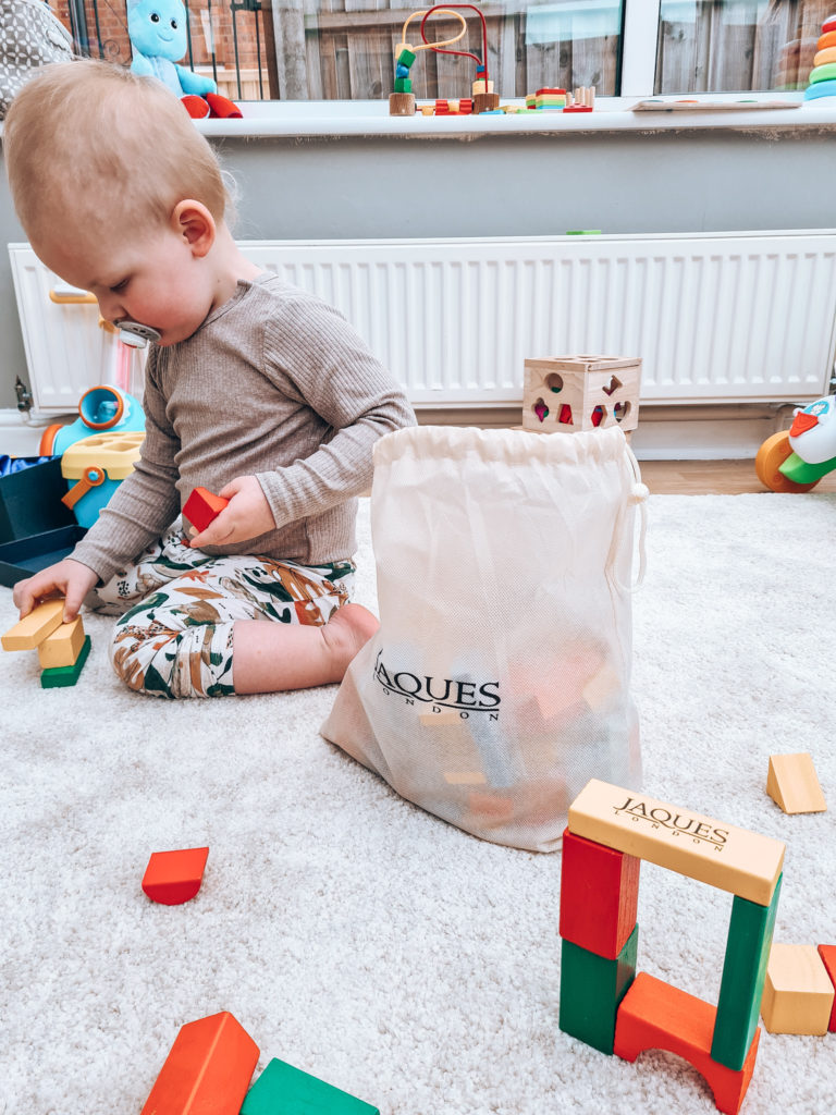 Aidan stacking blocks