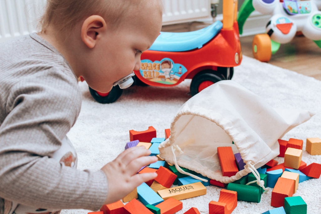 aidan playing with building blocks